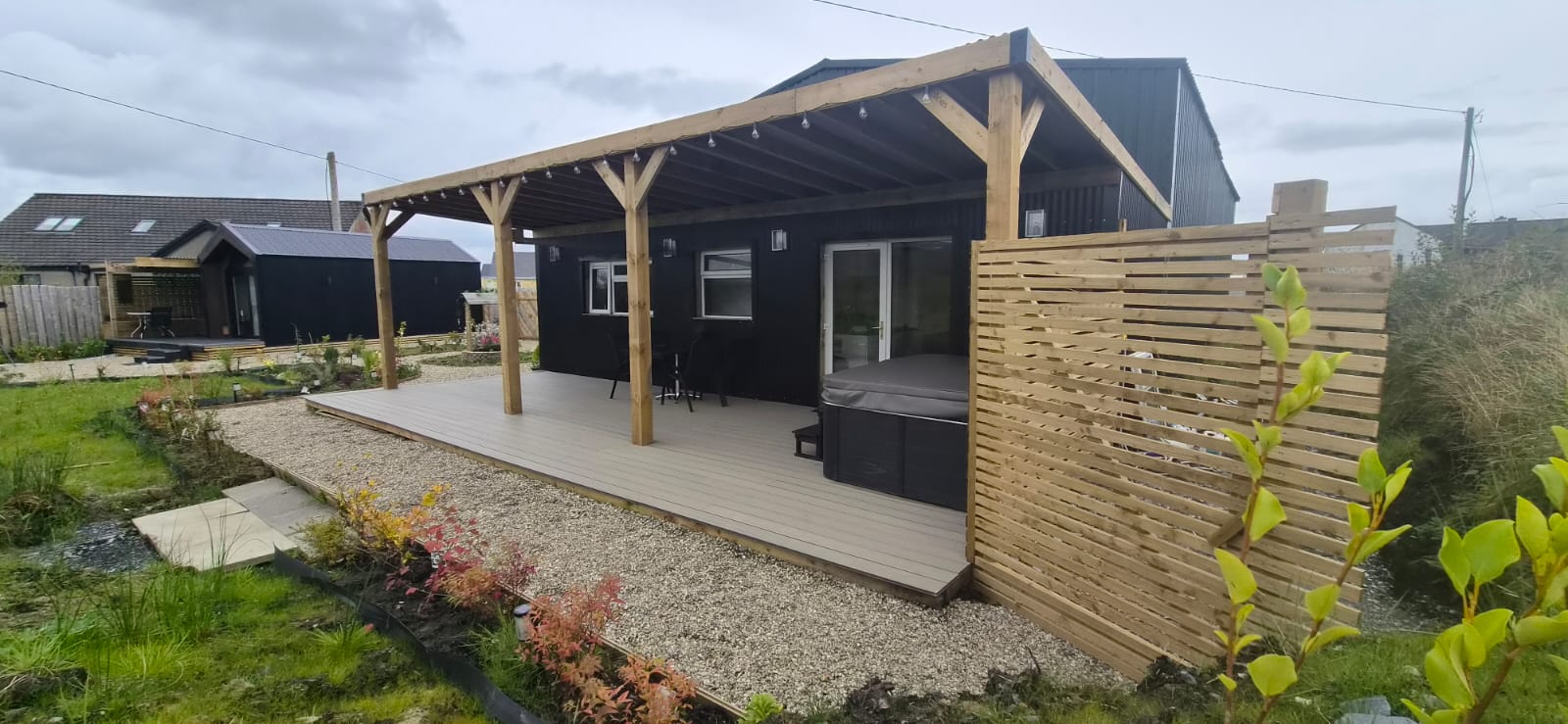 Covered deck with private hot tub